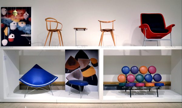 modern chairs displayed on white shelving