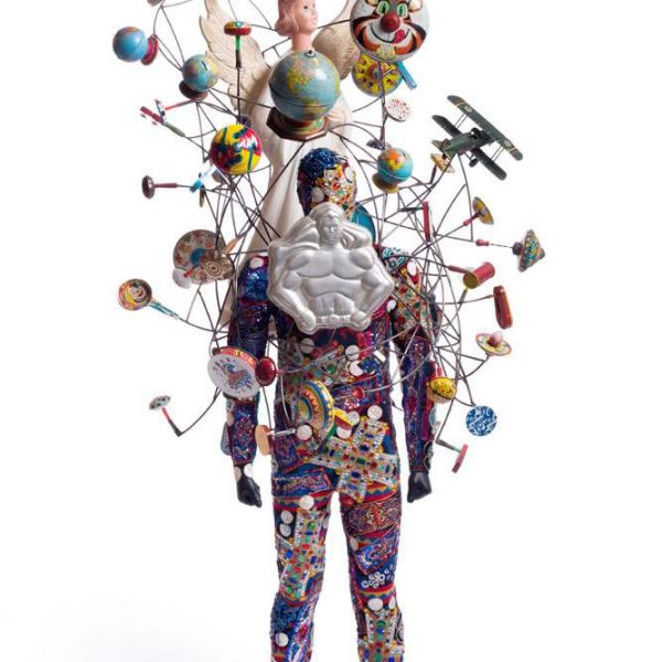 colorful human figure with globes suspended from wires