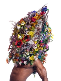 figure in colorful floral head covering