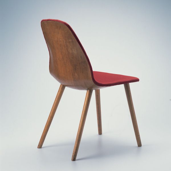 wooden chair with red fabric lining