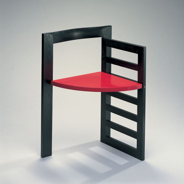 modern black chair with red seat