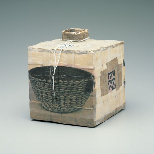 ceramic cube with painting of basket