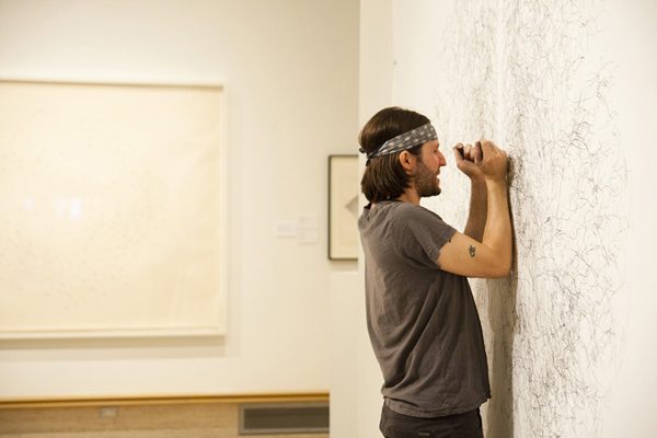 Tony Orrico drawing on wall