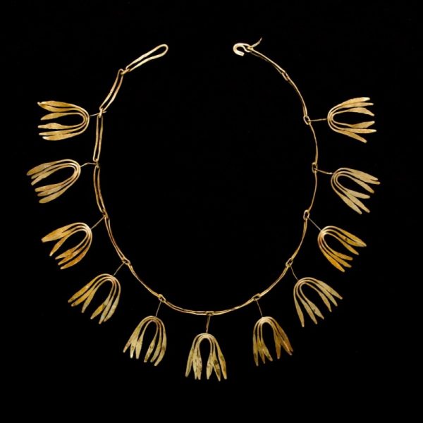 gold metal necklace, Saarinen