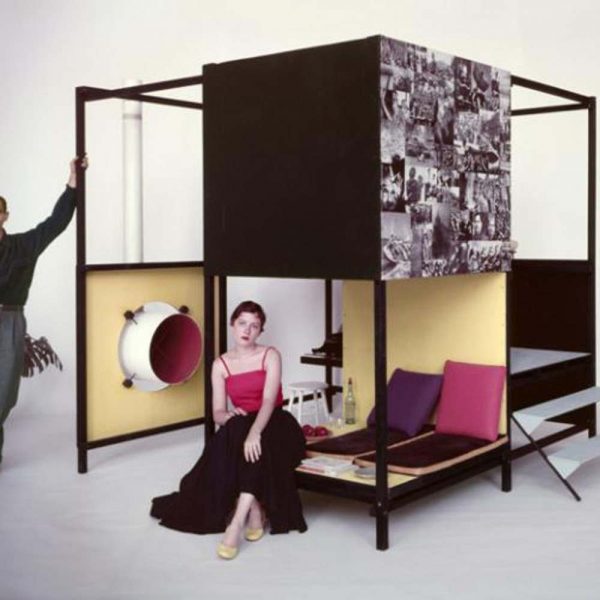 man and woman pose with modern cube furniture