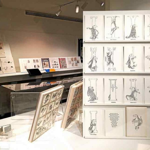 Edward Gorey sketches on white display board