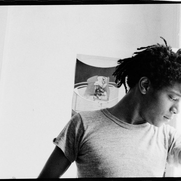 Basquiat posing near window