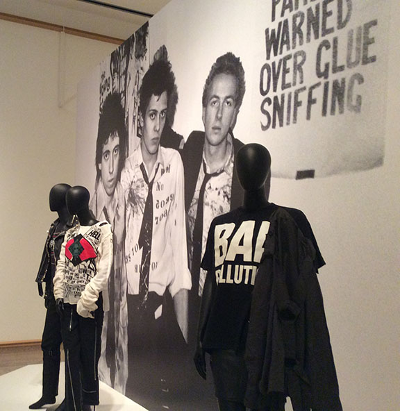 Large punk wall mural with three mannequins