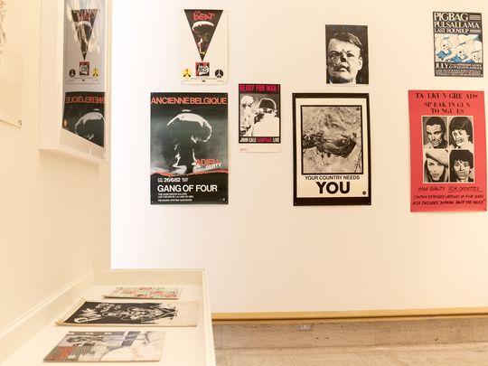 series of posters against white wall