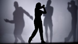 female silhouette posing in cheer, Red 10, Danielle Dean