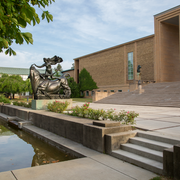 Sculpture of woman riding bull