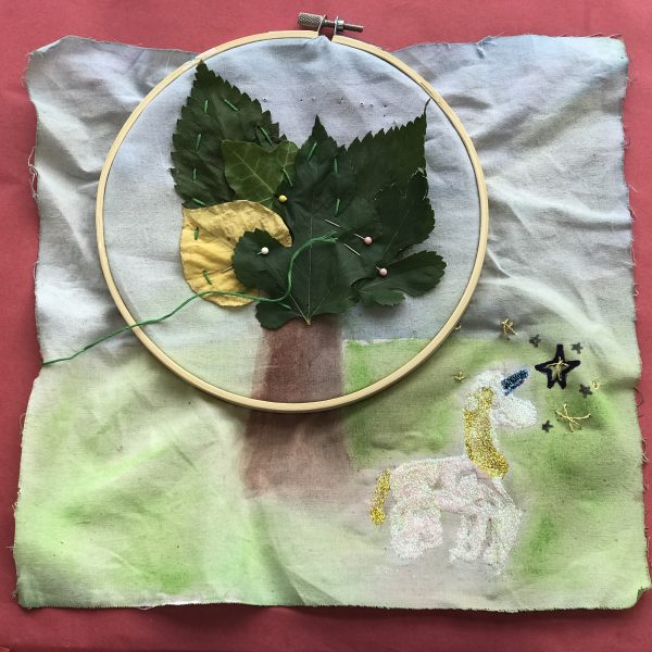 Create Camps, leaves stitched to fabric with unicorn