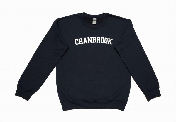 Navy blue crewneck sweatshirt with "CRANBROOK" written across check in white