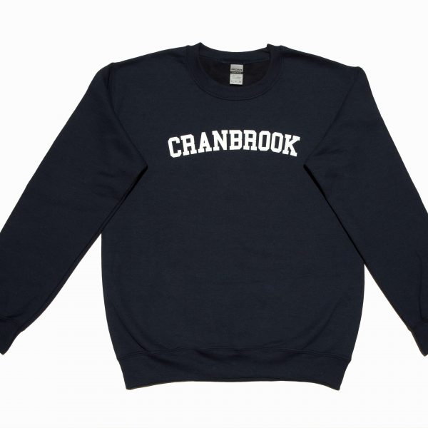 Navy blue crewneck sweatshirt with "CRANBROOK" written across check in white
